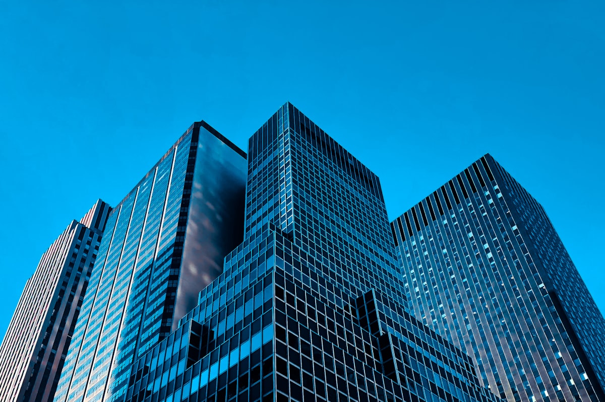 Modern enterprise office towers against a clear sky